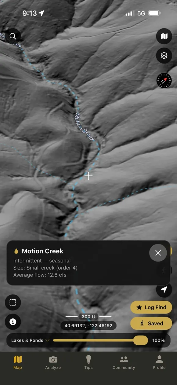 A creek traced across bare earth lidar with its detail sheet open, naming the creek, its flow regime, its size class and its average annual flow in cubic feet per second